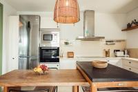 A kitchen or kitchenette at Villa Tramuntana Luxury Sea View Retreat - Cap d'en Font, Menorca