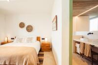 A bed or beds in a room at Villa Tramuntana Luxury Sea View Retreat - Cap d'en Font, Menorca
