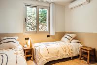 A bed or beds in a room at Villa Tramuntana Luxury Sea View Retreat - Cap d'en Font, Menorca