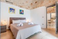 Posteľ alebo postele v izbe v ubytovaní Relais I Secolari