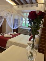 Postel nebo postele na pokoji v ubytování Casa Jardín El Colmenar