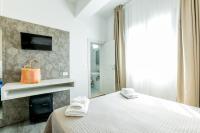 Posteľ alebo postele v izbe v ubytovaní Hotel Kim