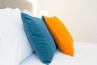 Postel nebo postele na pokoji v ubytování Vila Julieta Guesthouse