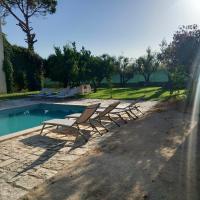 The swimming pool at or close to MASSERIA INCANTAMENTO Suite Bouganville