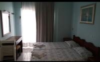 Posteľ alebo postele v izbe v ubytovaní Maria's Hotel