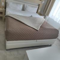 Posteľ alebo postele v izbe v ubytovaní CH-Hotel Luka
