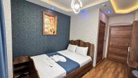 Postel nebo postele na pokoji v ubytování La Vien Hotel Old City