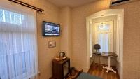 TV a/nebo společenská místnost v ubytování La Vien Hotel Old City