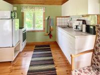 Kuchyň nebo kuchyňský kout v ubytování Two-Bedroom Holiday home in Braås