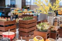 a table topped with lots of different types of food at 南宁安吉希尔顿欢朋酒店 in Nanning