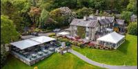 an aerial view of a house with a garden at Porthmadog Aberdunant hall holiday camp in Porthmadog