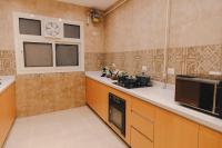 Kuchyň nebo kuchyňský kout v ubytování Signature Stays Breezy Modern Apt