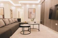 Posezení v ubytování Signature Stays Breezy Modern Apt