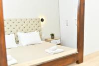 A bed or beds in a room at Casa del mar