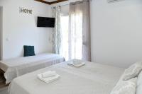 A bed or beds in a room at Casa del mar