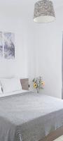 Posteľ alebo postele v izbe v ubytovaní Eva apartment