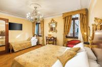 Posteľ alebo postele v izbe v ubytovaní Hotel Ca' Alvise