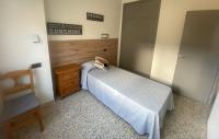 Posteľ alebo postele v izbe v ubytovaní Apartament Centre Platja