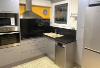 Kuchyňa alebo kuchynka v ubytovaní Apartament Centre Platja
