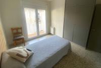 Posteľ alebo postele v izbe v ubytovaní Apartament Centre Platja