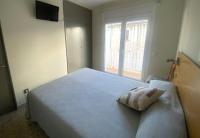 Posteľ alebo postele v izbe v ubytovaní Apartament Centre Platja