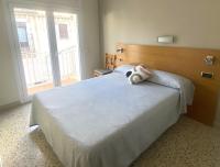 Posteľ alebo postele v izbe v ubytovaní Apartament Centre Platja