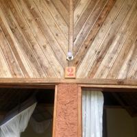 a wooden ceiling with a number on the door at Soanala in Moramanga