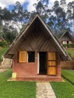 a small house with a thatched roof at Soanala in Moramanga