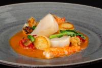 a plate of food with shrimp and other foods at Glenapp Castle in Ballantrae