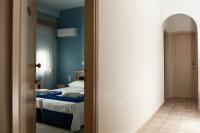 Posteľ alebo postele v izbe v ubytovaní Hôtel Argo