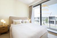 Postel nebo postele na pokoji v ubytování NewArabian Dubai Hills Sidra Villa