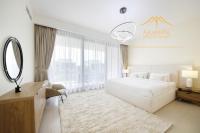 Postel nebo postele na pokoji v ubytování NewArabian Dubai Hills Sidra Villa