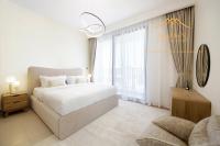 Postel nebo postele na pokoji v ubytování NewArabian Dubai Hills Sidra Villa