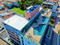 an overhead view of a building with a swimming pool at Villas do Porto APTO 05 - Porto de Galinha in Porto De Galinhas