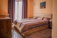 Postel nebo postele na pokoji v ubytování Апартамент Пирин Apartment Pirin