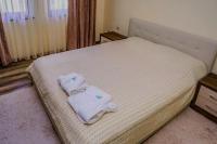 Postel nebo postele na pokoji v ubytování Апартамент Пирин Apartment Pirin