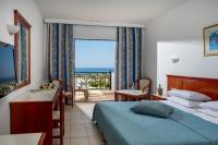 Posteľ alebo postele v izbe v ubytovaní Mare Village