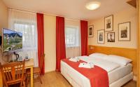 Posteľ alebo postele v izbe v ubytovaní Residence AlpenHeart