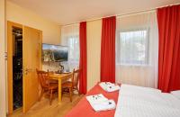 Posteľ alebo postele v izbe v ubytovaní Residence AlpenHeart