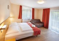 Posteľ alebo postele v izbe v ubytovaní Residence AlpenHeart