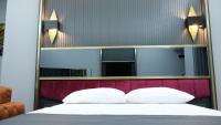 Postel nebo postele na pokoji v ubytování 216 Prestige Hotel