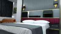 Postel nebo postele na pokoji v ubytování 216 Prestige Hotel