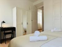 A bed or beds in a room at Apartamentos Alcazaba