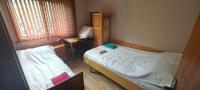 Postel nebo postele na pokoji v ubytování Waterfall Guest House