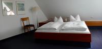 Postel nebo postele na pokoji v ubytování Hotel Restaurant Schwane
