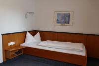 Postel nebo postele na pokoji v ubytování Hotel Restaurant Schwane