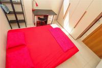 A bed or beds in a room at Helios Villa Sea Front - 3 bedrooms 7 guests