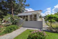 A garden outside Helios Villa Sea Front - 3 bedrooms 7 guests