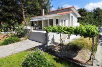 A garden outside Helios Villa Sea Front - 3 bedrooms 7 guests