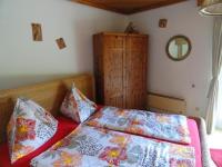 Posteľ alebo postele v izbe v ubytovaní Ruhige Wohnung mit schönem Eigengarten in Seeboden am Millstättersee